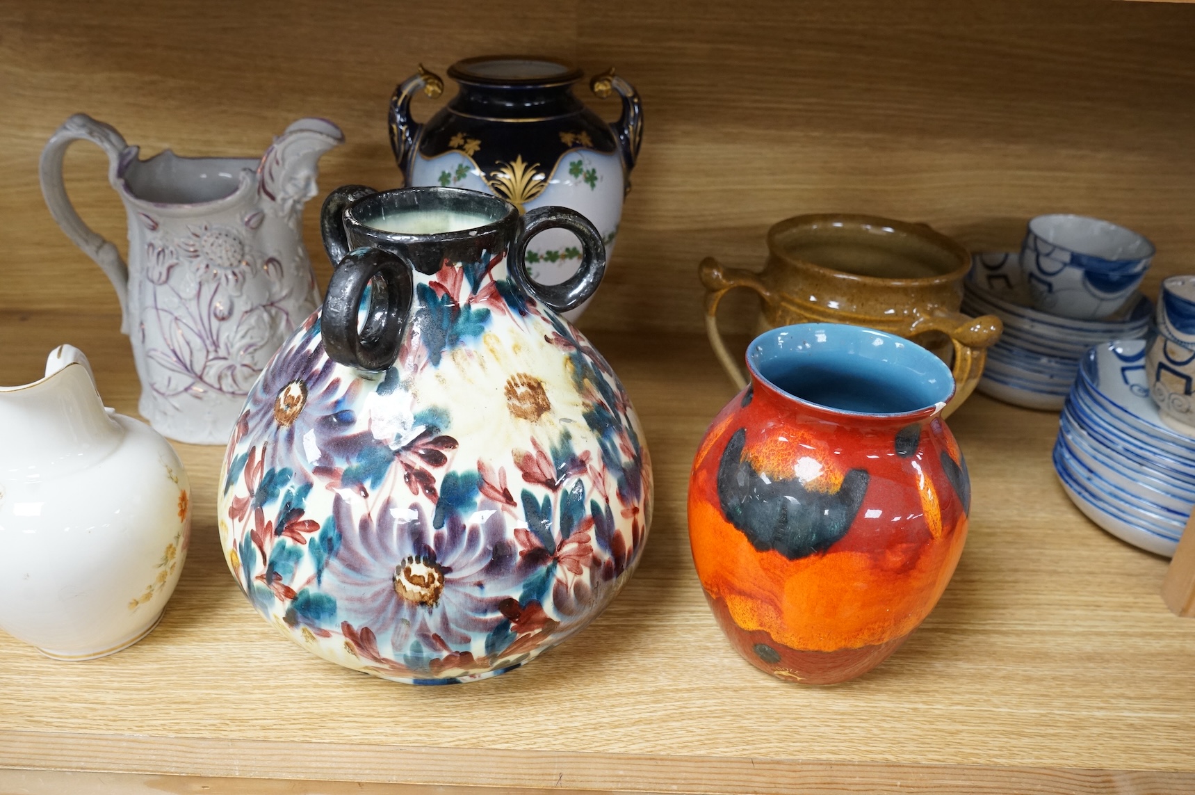 A collection of seven various ceramic vessels including Bretby, Poole, Worcester, continental art pottery etc. 26cm